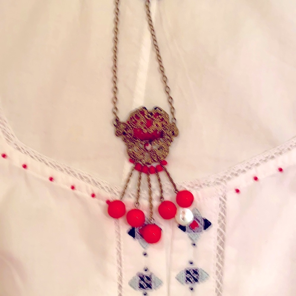 Bronze necklace with enamel and red stones